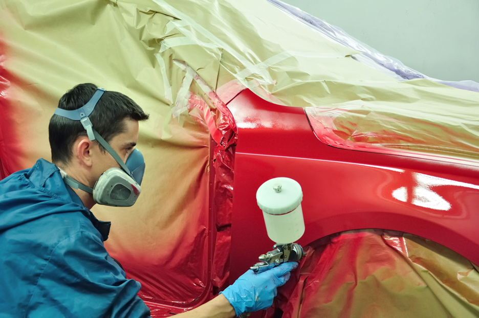 Auto Body Painting At A Repair Shop