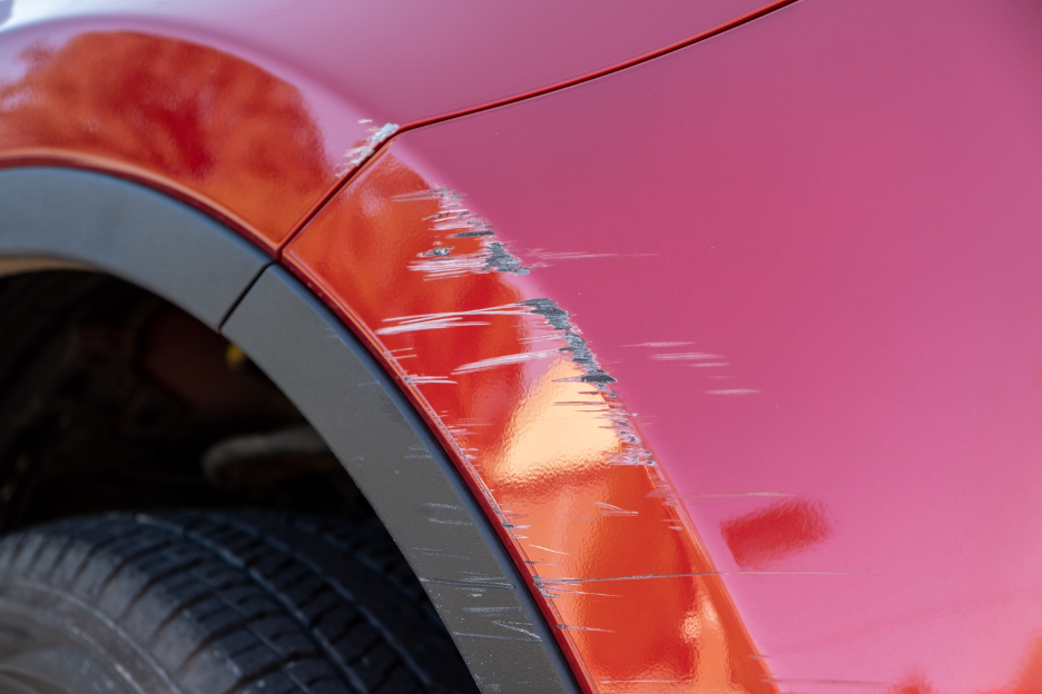 Car Paint Scratch Near The Wheel Well