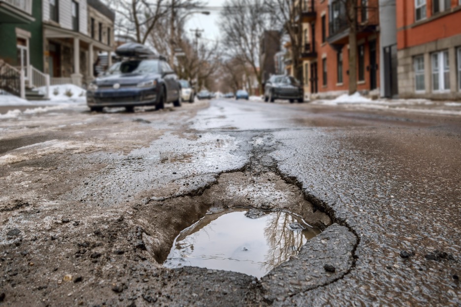 Car Damage From A Pothole In Lombard, Illinois